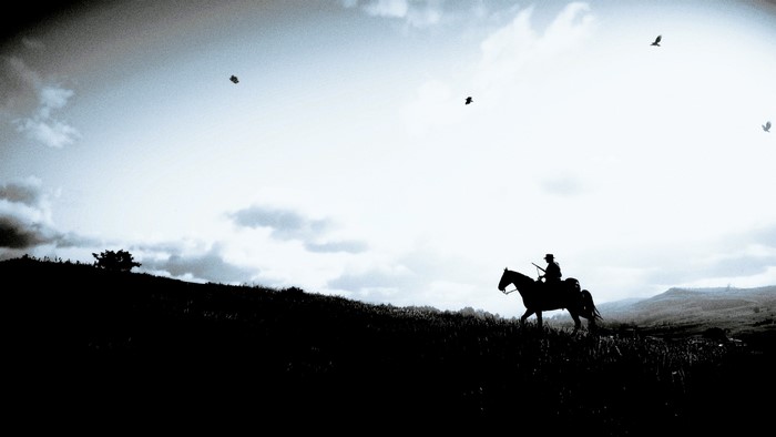Outlaw on horseback in Red Dead Redemption 2