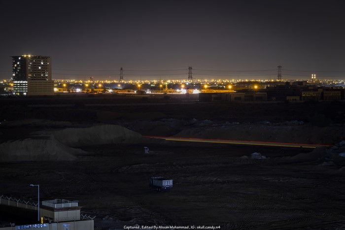 Night landscape with city lights and long exposure light trails