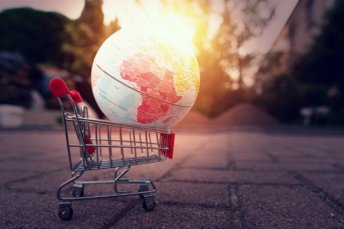 Globe in a shopping cart outdoors