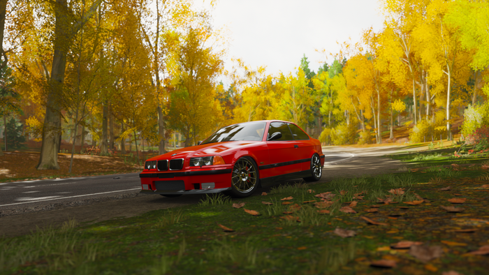 Red BMW M3 E36 on Autumn Road in