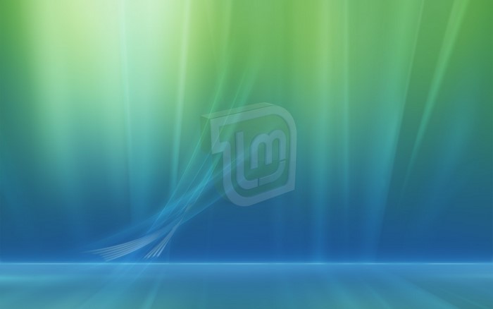 Linux Mint logo on abstract green and blue background