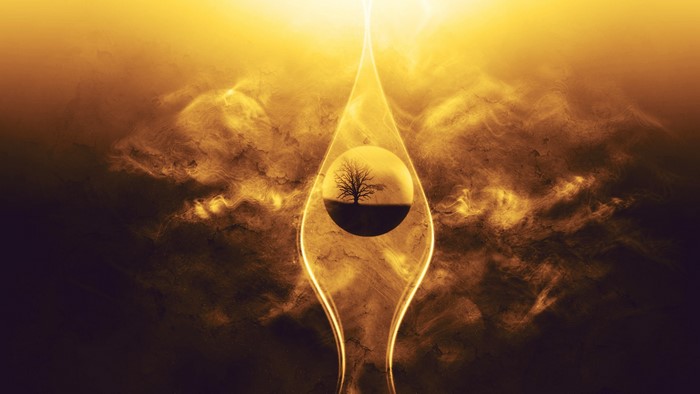 Tree inside a glowing droplet against a golden nebula