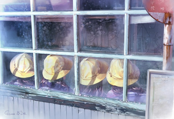 Children in yellow hats looking out a window