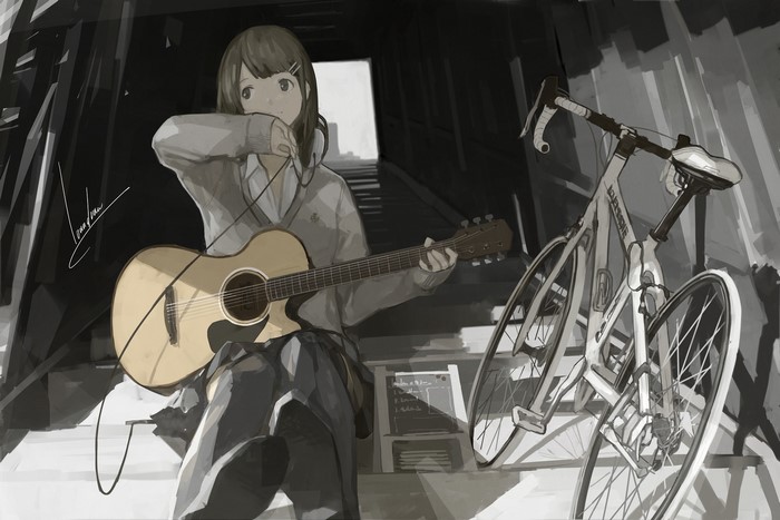 Girl playing guitar next to a bicycle