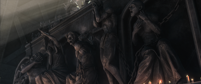 INCARNATION statues in dark hall