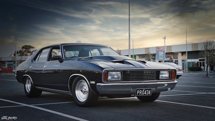 Black Ford Falcon muscle car in a car park