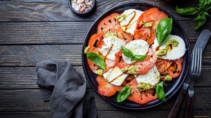 Caprese salad with tomatoes and mozzarella on a plate