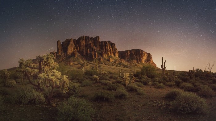 Desert landscape with mountains and stars in Arizona