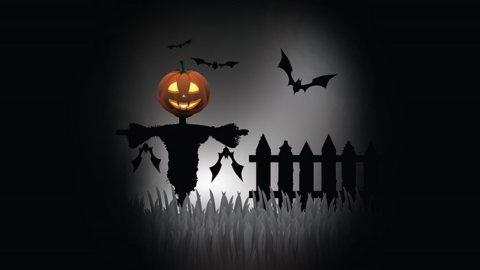 Halloween scarecrow with pumpkin head and bats