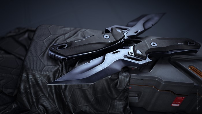 Two futuristic knives on a textured surface
