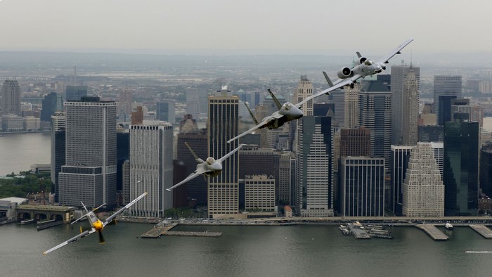 Four military aircraft fly over New York City