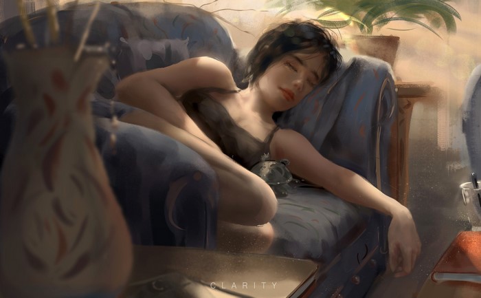 Woman sleeping on a chair with a turtle