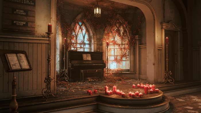 Church interior with piano, candles, and autumn leaves