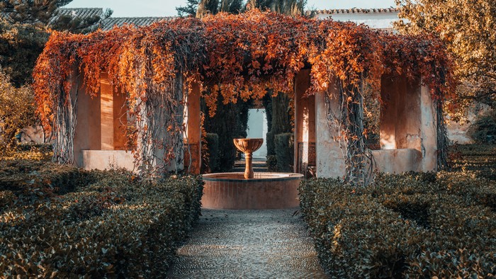Autumnal garden with fountain in Bornos