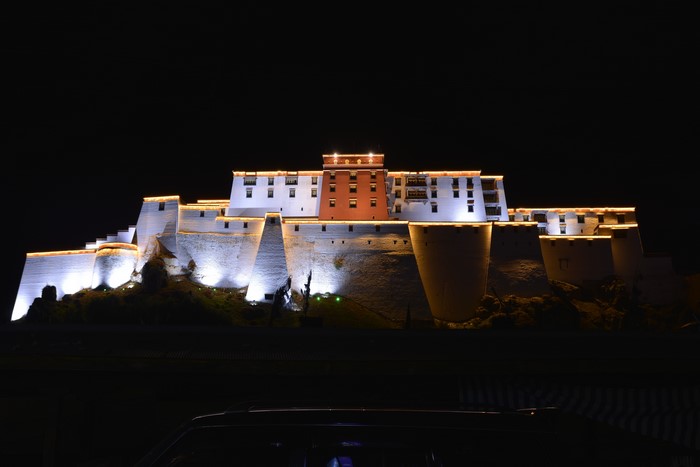 Sangzhuzi Palace at night in Tibet