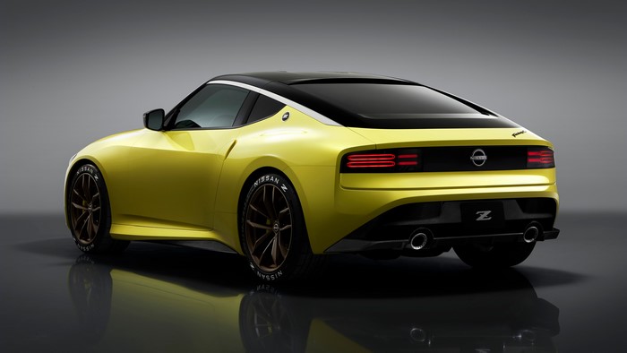 Yellow Nissan 400Z sports car with black roof