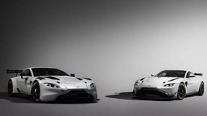 Two white Aston Martin GT4 and GT3 race cars