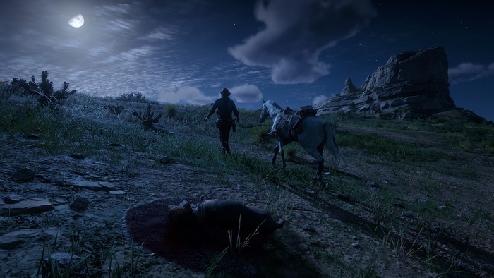 Red Dead Redemption 2: Man and horse at night