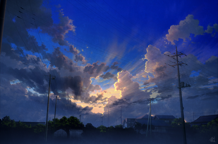 Sunset with dramatic clouds and power lines