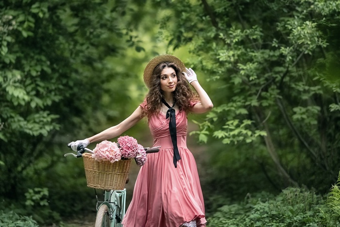 Woman in Pink Dress with Vintage Bicycle