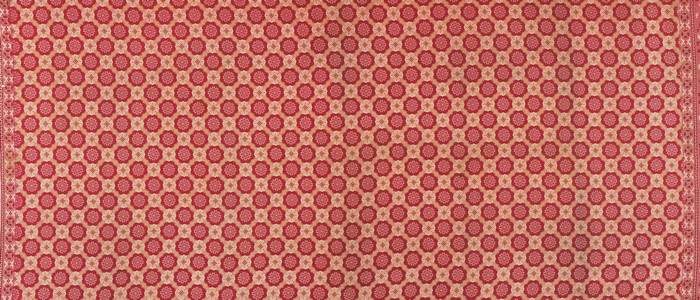 Red and beige geometric fabric texture