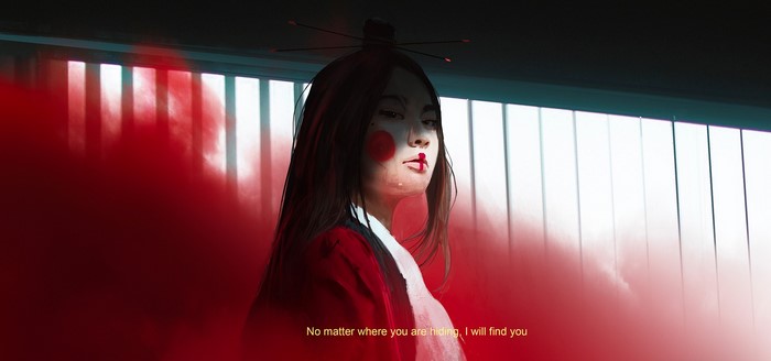 Woman in traditional Japanese attire with red makeup