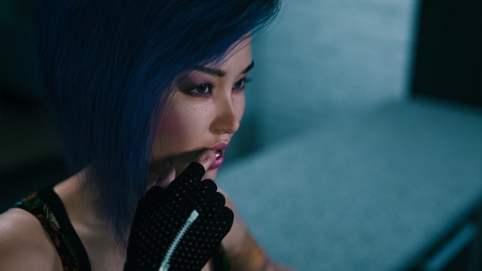 Asian woman with blue hair and makeup