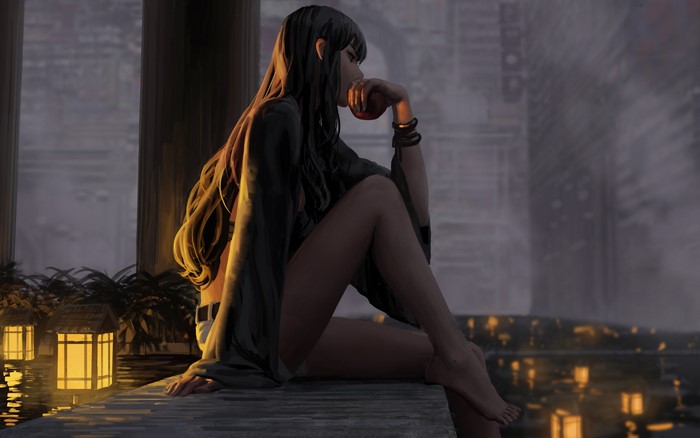Woman sitting by water with lanterns