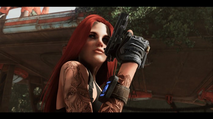 Redhead woman with tattoos holding a pistol