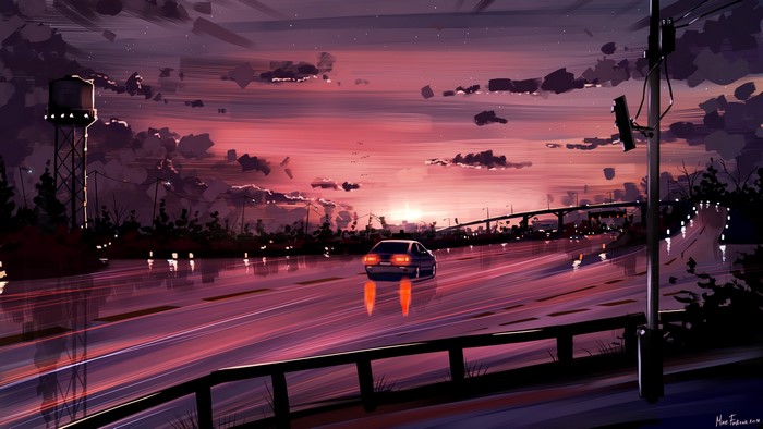 Car driving on a highway at sunset