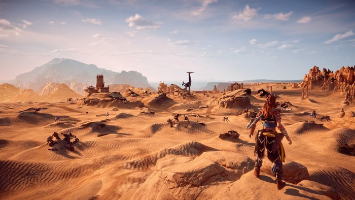 Aloy from Horizon Zero Dawn in a desert landscape