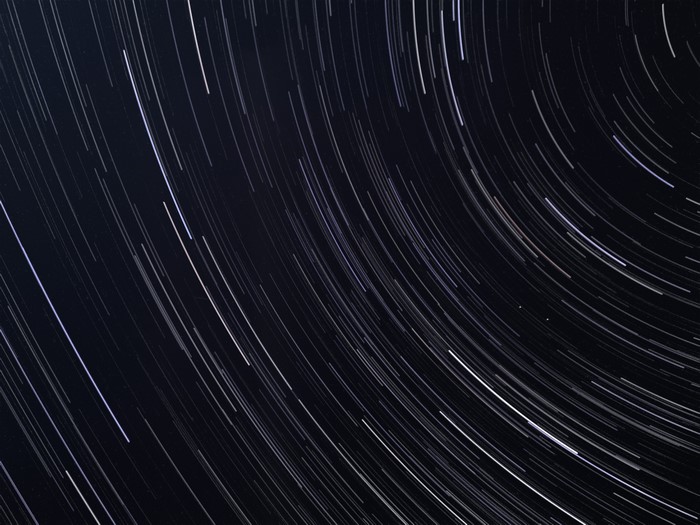 Star trails in the night sky over Italy
