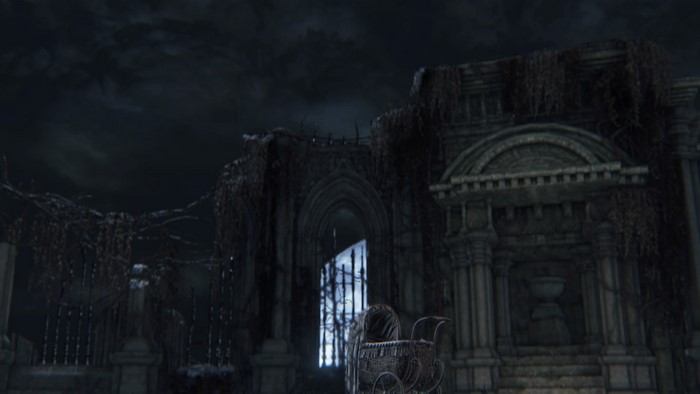 Bloodborne screenshot of a creepy courtyard with a baby carriage