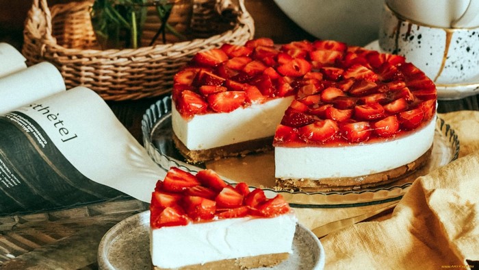 Strawberry cheesecake with a slice removed