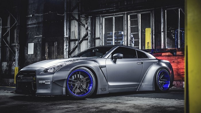 Silver Nissan GT-R with Blue Rims and Widebody Kit