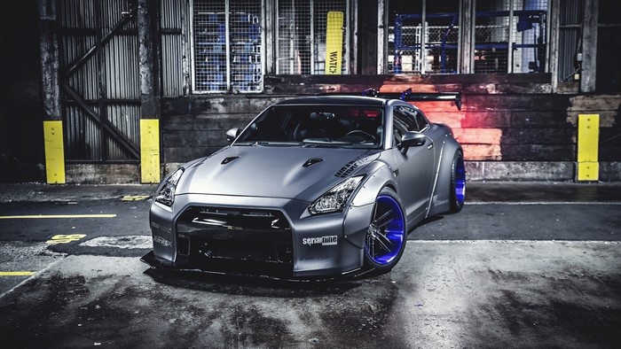 Matte gray Liberty Walk Nissan GT-R with blue wheels