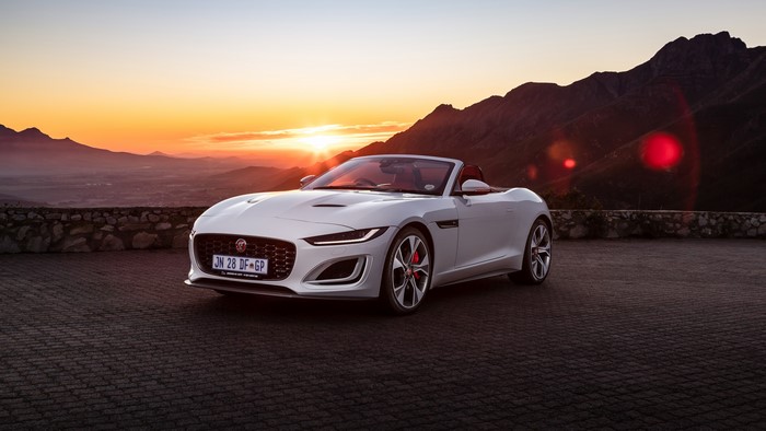 White Jaguar F-Type Convertible at Sunset with Mountains