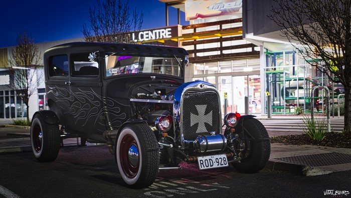 4K Hot Rod with Iron Cross grille at night