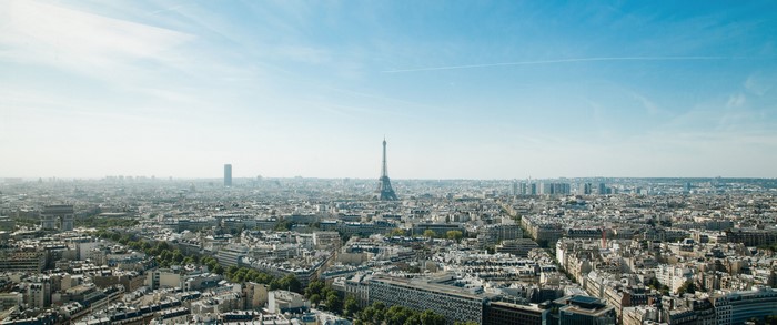 Paris cityscape with Eiffel Tower and Arc de Triomphe