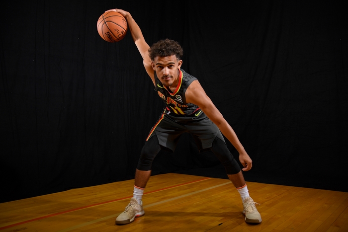 Trae Young of the Atlanta Hawks holding a basketball
