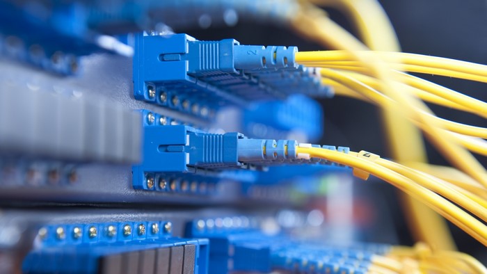 Fiber optic cables connected to network equipment