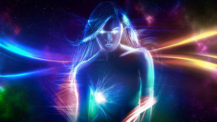 Woman made of glowing blue energy in a colorful galaxy