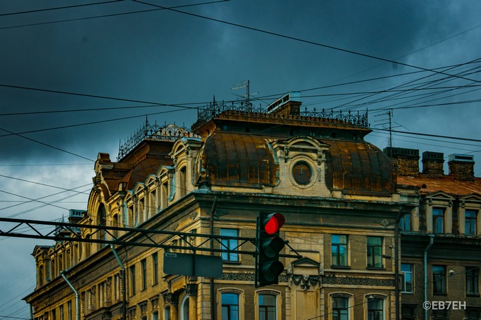 Cityscape with traffic light and old architecture in Russia