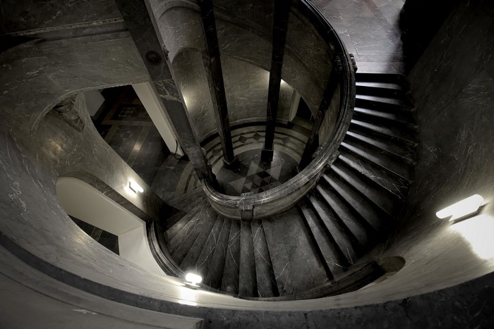 Spiral staircase in a marble building