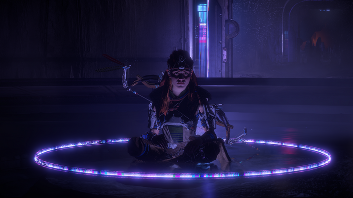 Aloy from Horizon Zero Dawn sitting in a bunker