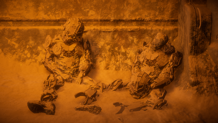 Two soldiers in exosuits in a bunker