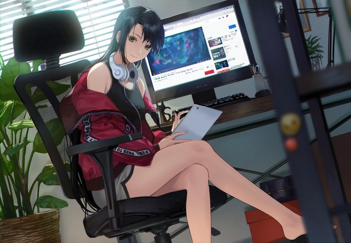 Anime girl with headphones using a tablet and computer