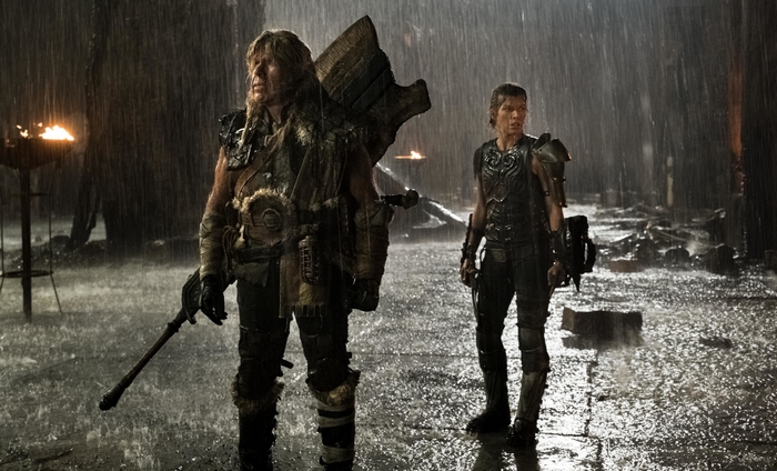 Monster Hunter: Ron Perlman and Milla Jovovich in the Rain