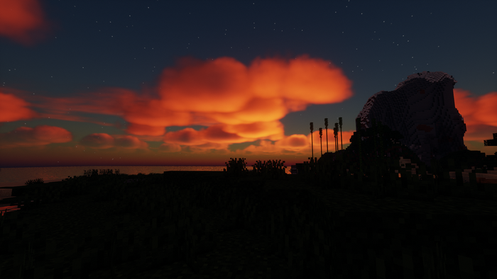 Minecraft sunset over ocean with clouds and island
