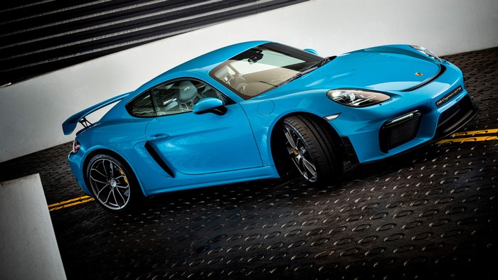 Blue Porsche 718 Cayman GT4 sports car
